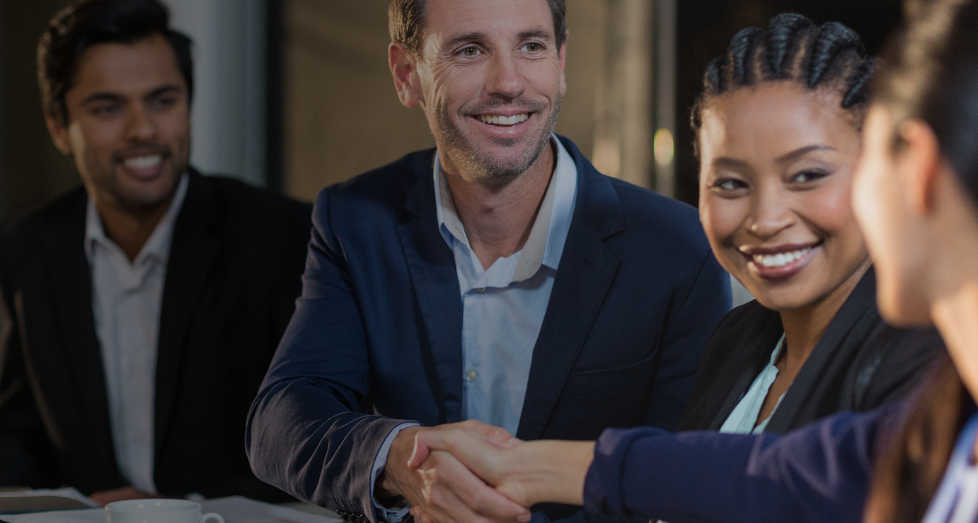 Insurance agency owners shaking hands